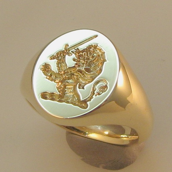 Demi lion with sword crest engraved signet ring