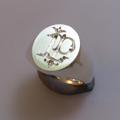 Two initial monogram signet rings