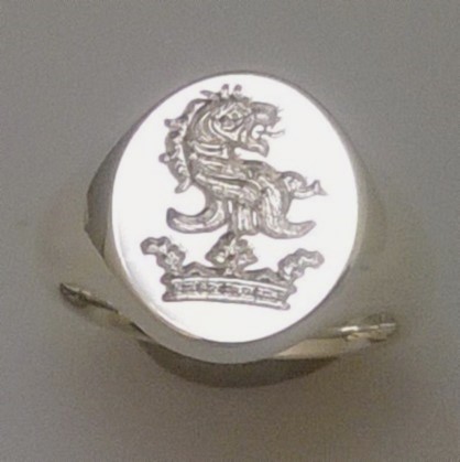 Lion head above coronet crest engraved signet ring